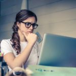 girl researching computer for information